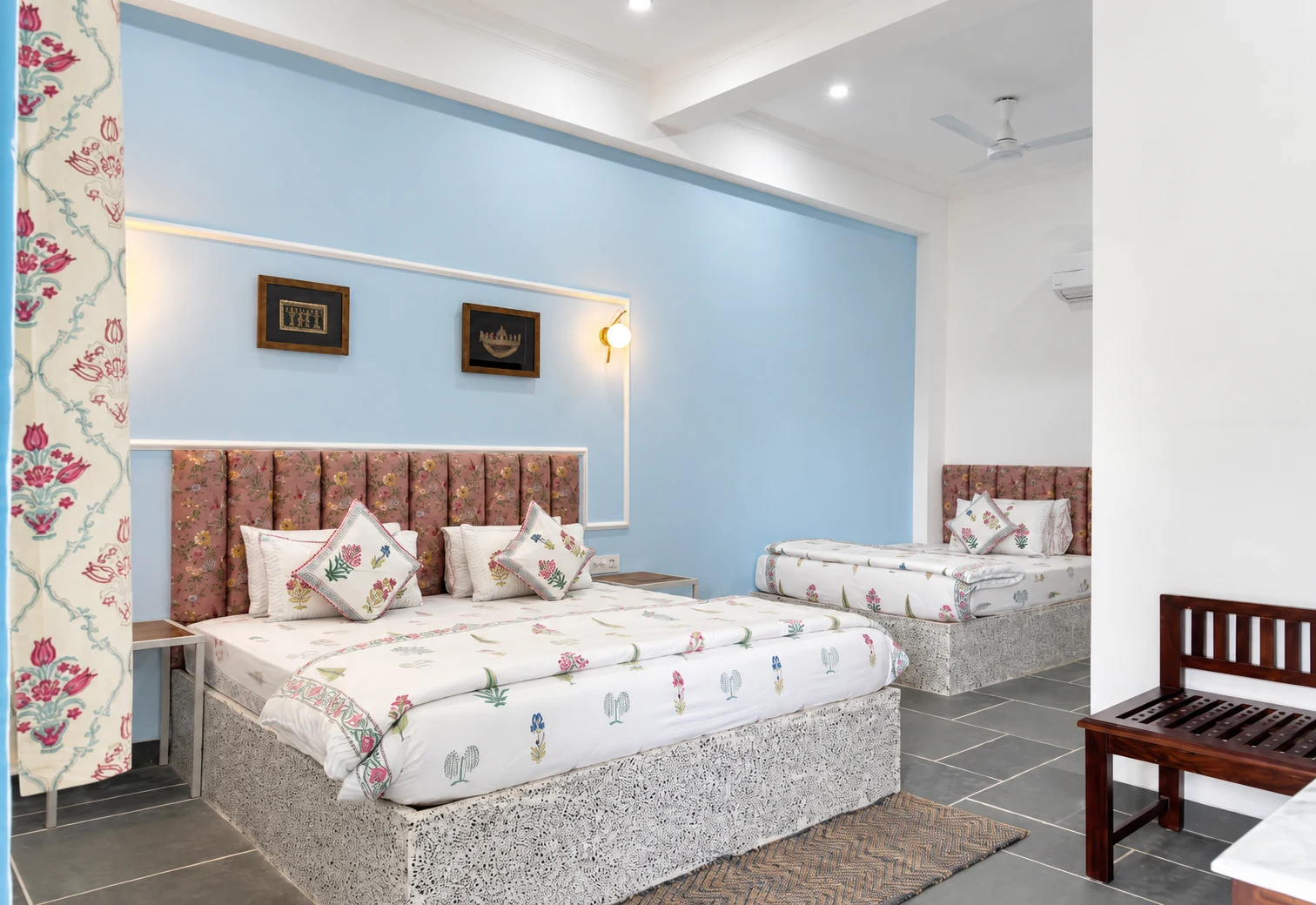 Twin beds and patterned textiles at Da Bungalow in Agra